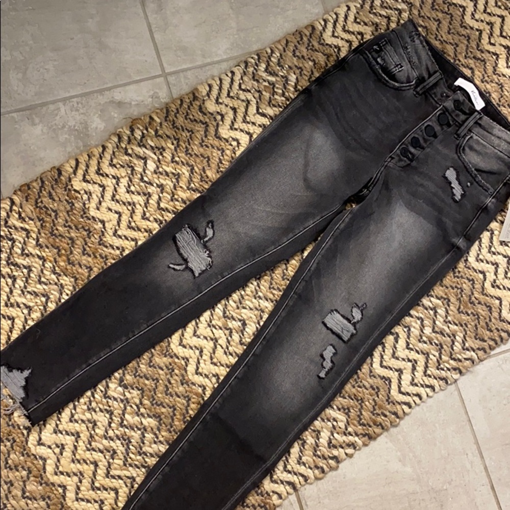 Black distressed skinny jeans